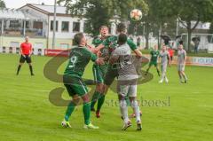 BZL - Bezirksliga Oberbayern Nord - Saison 2021/22 - SV Manching - SV Dornach - Kurz Thomas #6 grün Manching beim Kopfball - Abasse Malik grau Dornbach - Foto: Jürgen Meyer