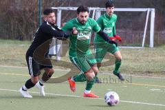 Freundschaftsspiel - Türk SV Ingolstadt - SV Manching - Saison 2023/23 - Abdel Abou-Khalil grün Manching - Melih Soysal schwarz Türk SV - Foto: Meyer Jürgen