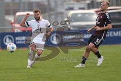 3. Liga - Saison 2023/24 - Testspiel - 1. FC Nürnberg - FC Ingolstadt 04 - Yanick Deichmann (Nr.20 - FCI) - Geis Johannes (#5 Nürnberg) - Foto: Meyer Jürgen