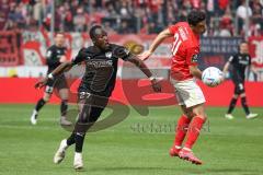 3.Liga - Saison 2022/2023 - Hallersche FC - FC Ingolstadt 04 - Moussa Doumbouya (Nr.27 - FCI) - Niklas Landgraf (Nr.31 - Halle) -  - Foto: Meyer Jürgen