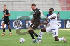 DFB Pokal; FC Ingolstadt 04 - SV Darmstadt 98; Patrick Schmidt (9, FCI) Zweikampf Kampf um den Ball Pfeiffer Patric (5 SVD)