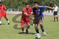 Testspiel - Bezirksliga - Saison 2025/26 - FC Fatih Ingolstadt - TSV Burgheim - Aaron Toski rot Fatih - Nick Vogel blau Burgheim  - Foto: Meyer Jürgen