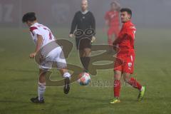 B - Junioren - Bayernliga - U17 - FC Ingolstadt 04 - 1. FC Nürnberg II -  Berk Baran rot FC Ingolstadt - Haxhiu Lion weiss Nürberg - Foto: Meyer Jürgen