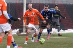 Schanzer Amateurcup 2026 - SV Haunwöhr - SC Irgertsheim - Marco Mosburger orange Irgertsheim - Patrick Mack blau Haunwöhr - Foto: Meyer Jürgen