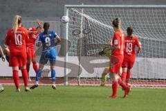 2. Fußball-Liga - Frauen - Saison 2022/2023 - FC Ingolstadt 04 - SC Sand - Torwart Maier Franziska (Nr.1 - FC Ingolstadt 04 ) - Mailbeck Alina (Nr.8 - FC Ingolstadt 04 ) - Reisch Katharina blau SC Sand köpft den Ball auf das Tor - Foto: Meyer Jürgen