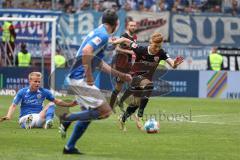 2.BL; FC Ingolstadt 04 - FC Hansa Rostock; Zweikampf Kampf um den Ball Christian Gebauer (22, FCI) Rhein Simon (5 Hansa)