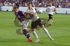 3.Liga - Saison 2022/2023 - VFL Osnabrück - FC Ingolstadt 04 - Erik Engelhardt (Nr.9 - VFL Osnabrück) - Calvin Brackelmann (Nr.17 - FCI) - Foto: Meyer Jürgen