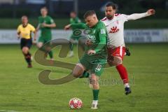 Landesliga - Saison 2024/25 - SV Manching - FC Gundelfingen - Sebastian Graßl (Nr.10 - SV Manching) - Elias Weichler weiss Gundelfingen - Foto: Meyer Jürgen