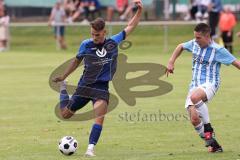 Kreisliga - Saison 2023/2024 - SV Menning  - FC Sandersdorf - Simon Wolfsfellner blau Menning - Christian Winkler weiss Sandersdorf - Foto: Meyer Jürgen