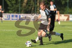 Bezirksliga - Saison 2025/26 - TSV Ober./Unterhaunstadt - VFR Garching - Oliver Günther - TSV Ober-/Unterh.stadt) - Leon Fellner schwarz Garching - Foto: Meyer Jürgen