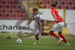 Bayernliga Nord - Saison 2026/27 - FC Ingolstadt 04 II - ASV Cham - Manuel Distl (Nr.9 - FCI II) - Alexander Sigl rot Cham - Foto: Meyer Jürgen