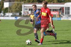 Kreisliga - Saison 2025/26- TSV Kösching - FC Mindelstetten - Lukas Kastl rot Kösching - Michael Betz blau Mindelstetten - Foto: Meyer Jürgen