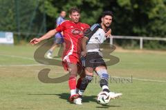 Testspiel - Bezirksliga - Saison 2025/26 - TSV Ober./Unterhaunstadt - Türkisch Ingolstadt  - Avni Avdijaj rot Türkisch  - Enes Erdogan weiss Ober./Unterh.stadt - Foto: Meyer Jürgen