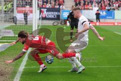 3. Liga - Saison 2023/24 - Rot-Weiss Essen - FC Ingolstadt 04 -  - Jose Enrique Rios Alonso (#23 Essen) - Jannik Mause (Nr.7 - FCI) - Foto: Meyer Jürgen