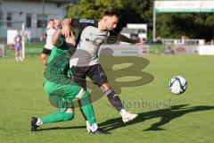 Bezirksliga - Saison 2025/26 - FC Gerolfing - TSV Ober./Unterh.stadt - David Simm grünn Gerolfing - David Polster (Nr.18 - TSV Ober-/Unterh.stadt) - Foto: Meyer Jürgen