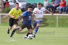 Kreisliga - Saison 2023/2024 - SV Menning - FC Mindelstetten - Alessandro Nikolaidis blau Menning - Michael Schneider weiss Mindelstetten - Foto: Meyer Jürgen
