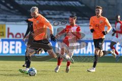 2024_1_20 - 3. Liga - Saison 2023/24 - HallescherFC - FC Ingolstadt 04 -  - Benjamin Kanuric (Nr.8 - FC Ingolstadt 04) - Aljaz Casar (Nr.17 - HallescherFC ) - Foto: Meyer Jürgen