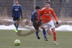 Schanzer Amateurcup 2026 - SV Haunwöhr - SC Irgertsheim - Pascal Mundil blau Haunwöhr - Yannic Dennerlein orange Irgertsheim - Foto: Meyer Jürgen