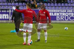 2. Fußball-Liga - Saison 2021/2022 - FC Erzgebirge Aue - Ingolstadt 04 - Peter Kurzweg (#16 FCI) - Dennis Eckert Ayensa (#7 FCI) -beim warm machen - Foto: Meyer Jürgen