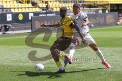 3. Fußball-Liga - Saison 2022/2023 - Borussia Dortmund II - FC Ingolstadt 04 - Soumaila Coulibaly (Nr.44 - Borussia Dortmund II) - Justin Butler (Nr.31 - FCI) - Foto: Meyer Jürgen