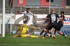 3. Liga - Saison 2026/27 - Victoria Köln - FC Ingolstadt 04  - Torwart Arne Schulz (Nr.1 - Viktoria Köln) - Fredrik Carlsen (Nr.8 - FCI) - Foto: Meyer Jürgen