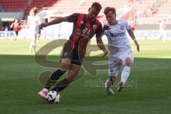 3. Liga - Saison 2024/25 - FC Ingolstadt 04 - SV Wehen Wiesbaden - Marcel Costly (Nr.22 - FCI) - Fabian  Greilinger (Nr.18 - SV Wehen Wiesbaden) - Foto: Meyer Jürgen