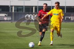 Freundschaftsspiel - Saison 2022/2023 - FC Ingolstadt 04 -  SpVgg Bayreuth - Tobias Weber (Nr.21 - SpVgg Bayreuth) - Patrick Schmidt (Nr.9 - FCI) - Foto: Meyer Jürgen