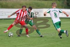 Landesliga - Saison 2025/26 - SV Manching - TSV Dachau  - Johannes  Dexl (Nr.13 - SV Manching) - Lorenz Knöferl rot Dachau - Rainer Meisinger (Nr.8 - SV Manching) - Foto: Meyer Jürgen