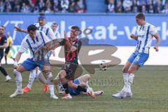 3. Liga; FC Hansa Rostock - FC Ingolstadt 04; Zweikampf Kampf um den Ball Gustav Christensen (24, FCI) Gürleyen Ahmet (15 HR) Mejdr Jan (19 HR)