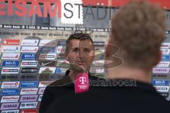 3.Liga - Saison 2023/2024 - SC Freiburg II - FC Ingolstadt 04 - Cheftrainer Michael Köllner (FCI) - im Interview mit Magenta Sport - Foto: Meyer Jürgen