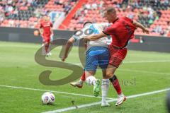 3. Liga; FC Ingolstadt 04 - FC Hansa Rostock; Zweikampf Kampf um den Ball Mattis Hoppe (2, FCI) Fatkic Kenan (4 HR)