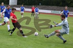 Kreisklasse -  Saison 2023/2024 - DJK Ingolstadt - FC Tegernbach - Christoph Ratberger rot Tegernbach - Sebastian Huber Torwart DJK Ingolstadt - Foto: Meyer Jürgen