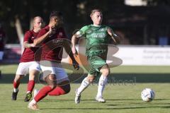 Kreisliga - Saison 2023/2024 - FC Gerolfing - Türk SV Ingolstadt - Lukas Achhammer grün Gerolfing - Halil Balaban rot Türk SV - Foto: Meyer Jürgen