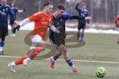 Schanzer Amateurcup 2026 - SV Haunwöhr - SC Irgertsheim - Maximilian Liebold orange Irgertsheim - Lukas Markus blau Haunwöhr - Foto: Meyer Jürgen