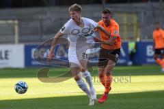3.Liga - Saison 2023/2024 - SC Freiburg II - FC Ingolstadt 04 - Joel Bichsel (Nr.25 - Freiburg II) - Jannik Mause (Nr.7 - FCI) - Foto: Meyer Jürgen