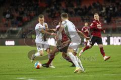 2.BL; 1. FC Nürnberg - FC Ingolstadt 04; Florian Pick (26 FCI) Dennis Eckert Ayensa (7, FCI) Zweikampf Kampf um den Ball