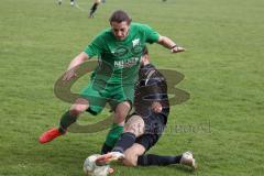 Fussball - Kreisliga - FC Grün Weiss Ingolstadt - FC Fatih Ingolstadt - Inan Düzgün grün GW Ing. - Emre Erdogan schwarz Fatih Ing . - Foto: Meyer Jürgen