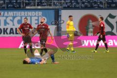 3. Liga - Hansa Rostock - FC Ingolstadt 04 - Spiel  ist aus, Unentschieden 1:1, Enttäuschung, hängende Köpfe,Michael Heinloth (17, FCI) Marc Stendera (10, FCI) Torwart Fabijan Buntic (24, FCI) Tobias Schröck (21, FCI)