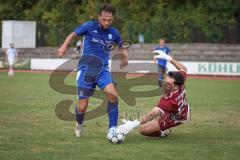 A-Klasse -  Saison 2026/27 - DJK Ingolstadt - TSV Mailing/Feldkirchen - Markus Käser blau DJK Ingolstadt  - Marco Ernhofer TW Mailing hält den Ball - Foto: Meyer Jürgen