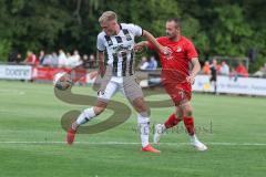 3. Liga; Toto-Pokal - VfB Forstinning - FC Ingolstadt 04; Zweikampf Kampf um den Ball Lars Lokotsch (13, FCI) Kirchev. Dimitar (7)