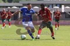 Testspiel - TSV Ingolstadt Nord - FC Augsburg II - Josue Mbila rot Augsburg - Onur Keskin blau TSV Ingolstadt - Foto: Jürgen Meyer