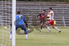 *** Bayernliga Nord - Saison 2025/26 - FC Ingolstadt 04 II - Jahn Regensburg II - Sekulovic Davide (Nr.33 - FC Ingolstadt II) - Hasa Samuel weiss Regensburg - Merkl Maurice Torwart Regensburg - Foto: Meyer Jürgen