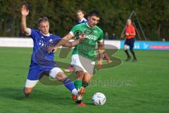 Kreisliga - Saison 2023/2024 - FC Gerolfing - TSV Ober/Unterhaunstadt - Florian Diegel blau Oberhaunstadt - Anastasios Porfyriadis grün Gerolfing - Foto: Meyer Jürgen