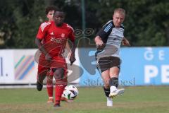 Testspiel - Bezirksliga - Saison 2025/26 - TSV Ober./Unterhaunstadt - Türkisch Ingolstadt  - Ousseynou Tamba rot Türkisch  - Florian Diegel weiss Ober./Unterh.stadt - Foto: Meyer Jürgen