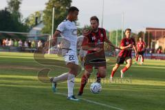 Toto Pokal - Saison 2022/2023 - SpVgg Heßdorf - FC Ingolstadt 04 - Marcel Costly (Nr.22 - FCI) - Daniel Vogel (Nr.16 - SpVgg Hessdorf) - Foto: Meyer Jürgen