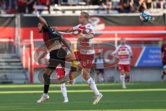 Toto-Pokal - Saison 2023/2024 - FC Ingolstadt 04 - Jahn Regensburg - David Kopacz (Nr.29 - FCI) - Louis Breunig (Nr.16 - Regensburg) - Foto: Meyer Jürgen