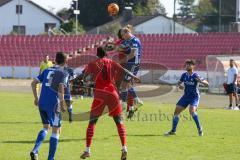 A - Junioren Bundesliga Süd/Südwest -  Saison 2021/2022 - FC Ingolstadt 04 - Karlsruher SC - Udebuluzor Michael (#21 FCI) - Theissinger Nico blau Karlsruhe beim Kopfball - Madougou Ibrahim (#9 FCI) - Foto: Meyer Jürgen