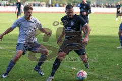 Emre Arik schwarz Fatih - Kreisliga - Saison 2023/2024 - FC Fatih Ingolstadt - TSV Münchsmünster - Moritz Feigl grau Münchsmünster - Foto: Meyer Jürgen