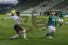 3. Liga - VfB Lübeck - FC Ingolstadt 04 - Justin Butler (31, FCI) schießt Rieble Nico (27 Lübeck) an