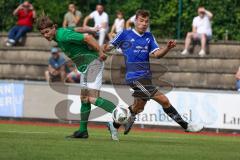 Sparkassenpokal - DJK Ingolstadt - FC Gerolfing - Fabian Kuppe blau DJK Ingolstadt - Stefan Schmid grün Gerolfing - Foto: Jürgen Meyer